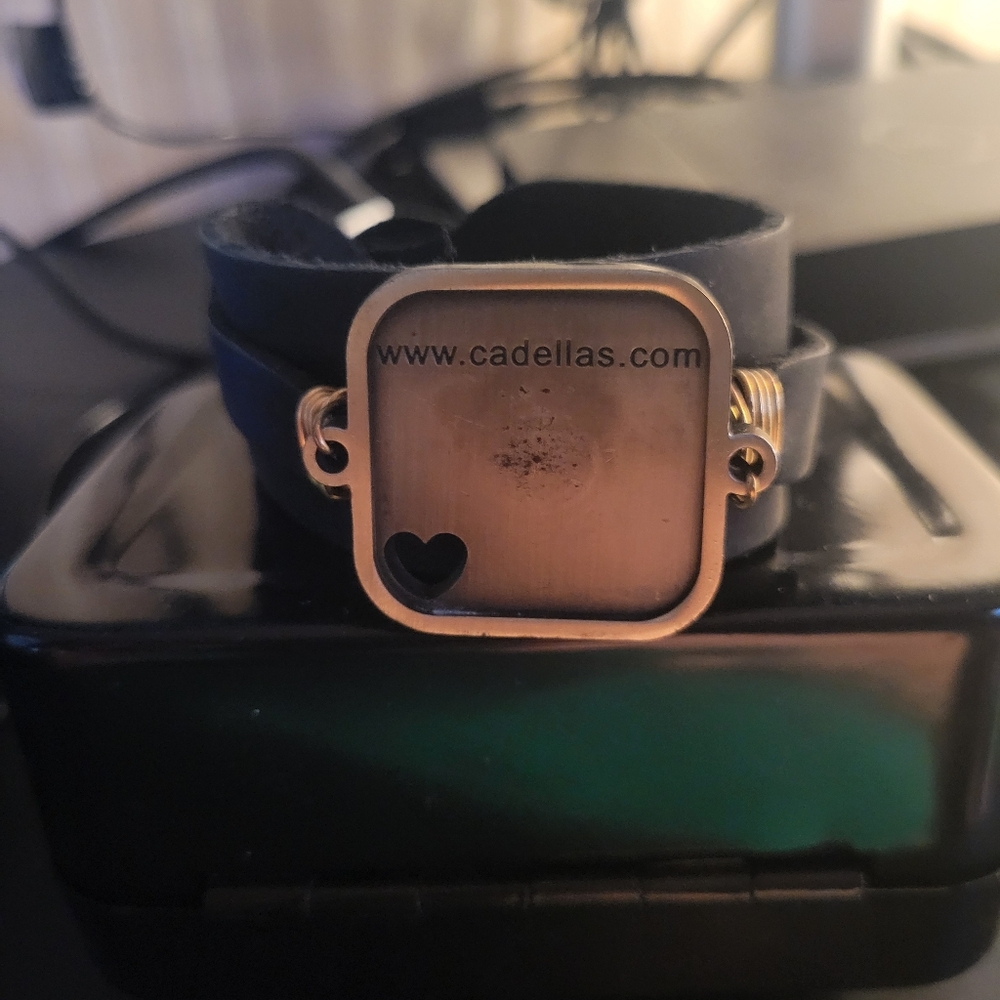 3/$30 Brass tone Face With Black Leather Wrap Cadellas Picture Bracelet